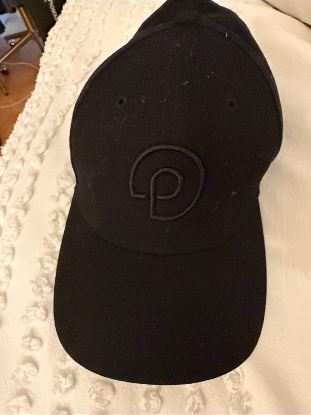 Black PvolveEmbroidered Logo Baseball Cap
